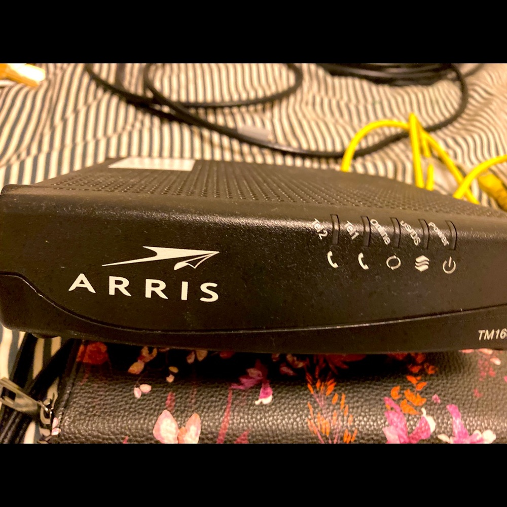Arris tm1602modem.have UTP patch cords router coax